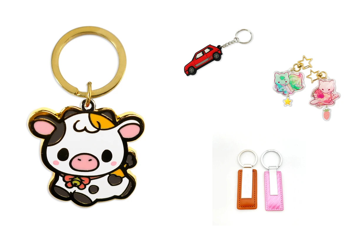Cow and red car keychains beside colorful character charms and stitched key fobs.