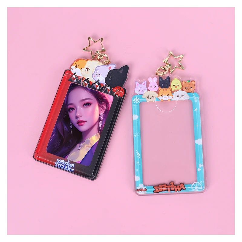 Two decorated acrylic photo-frame keychains, one holding a portrait.