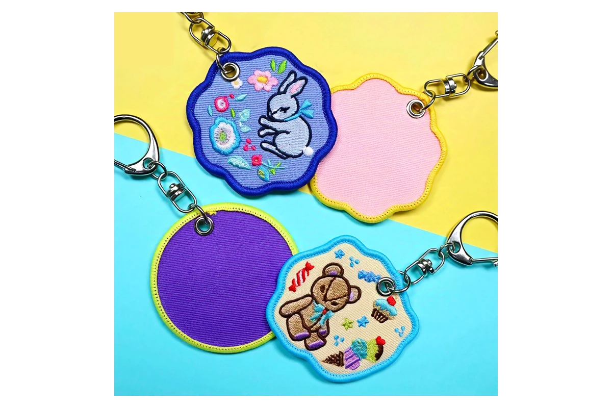 Embroidered animal motifs and plain reverse sides on fabric keychains