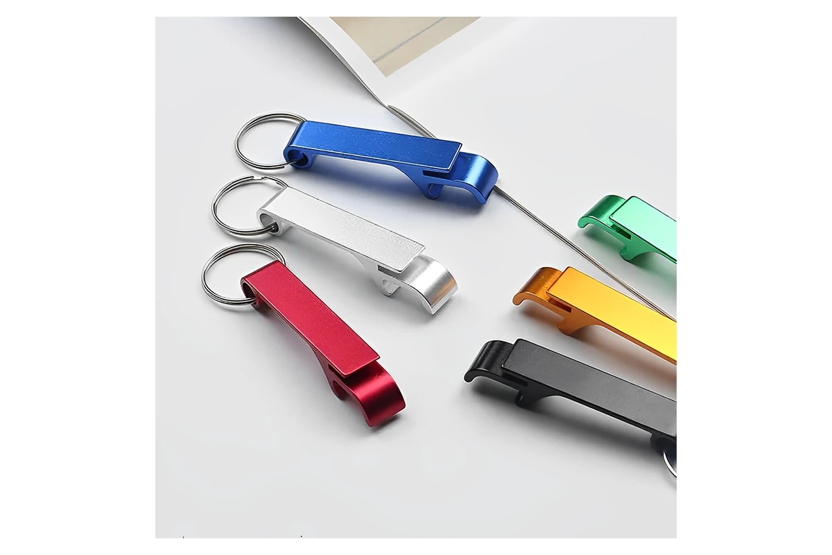 Colored metal bottle opener bodies with flat faces and curved opening ends