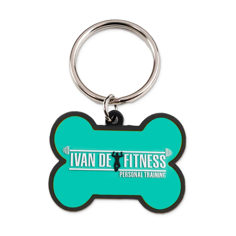 Turquoise bone-shaped silicone keychain with white logo lettering.