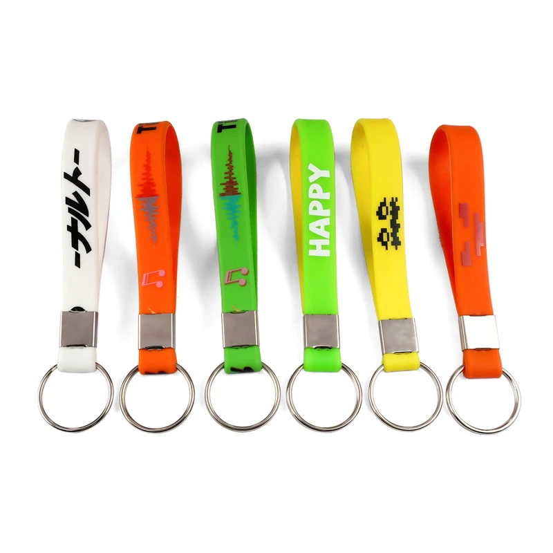 Bright silicone wristlet keychains with printed graphics and metal fittings.