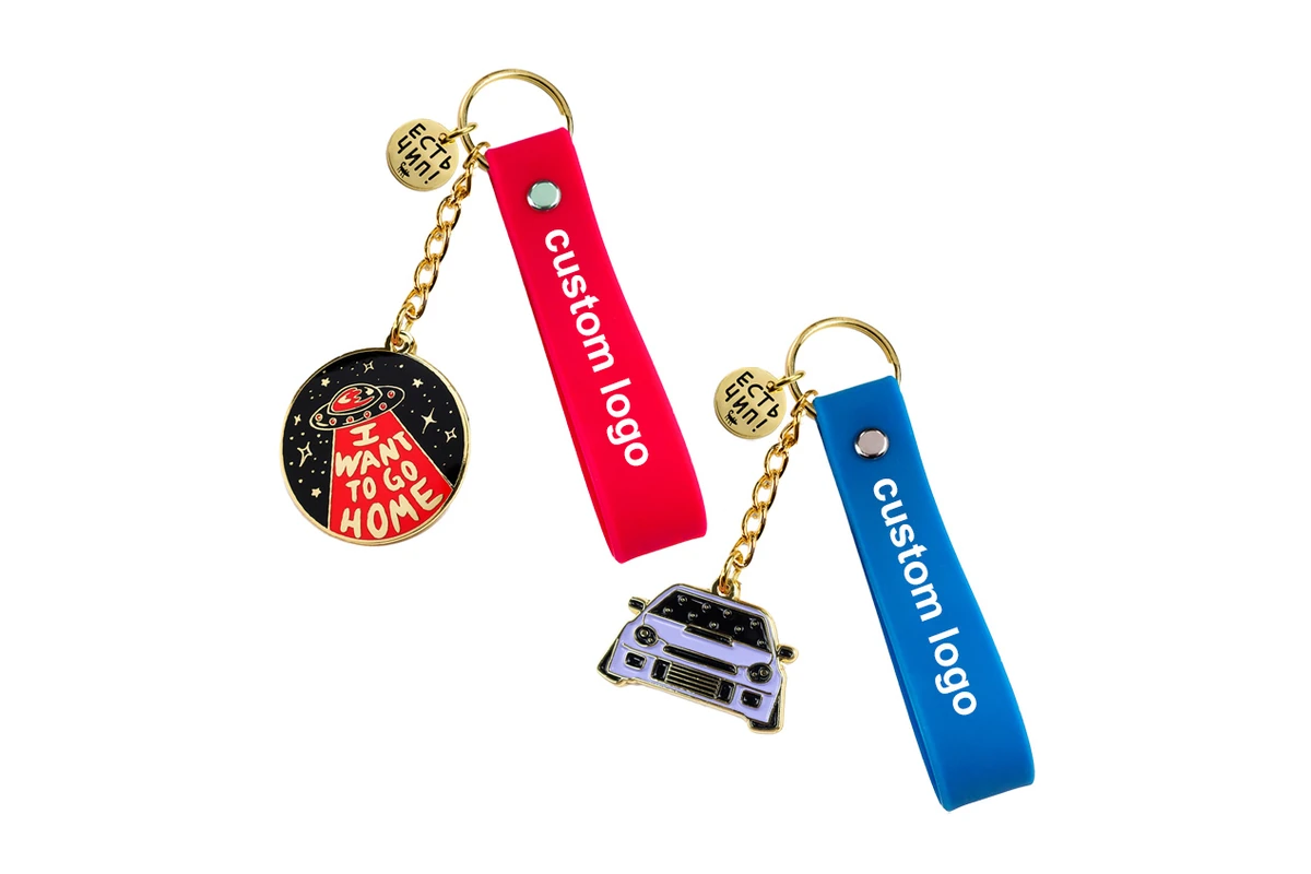 Red and blue silicone straps paired with metal charms and gold-colored fittings.