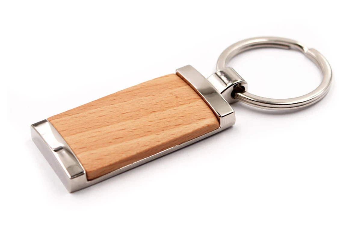 Wooden rectangular keychain with polished silver-tone end pieces and a split ring.