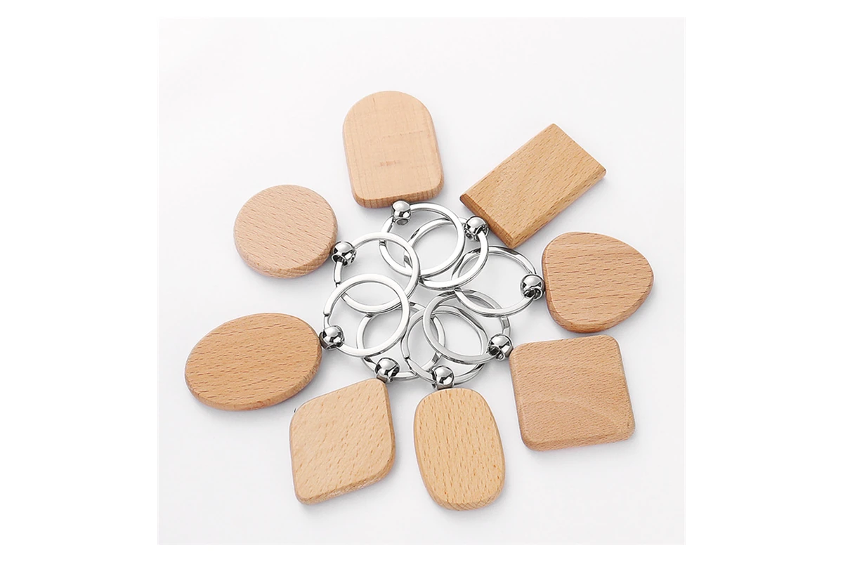Wooden keychain blanks in round, rectangular, oval and heart shapes.