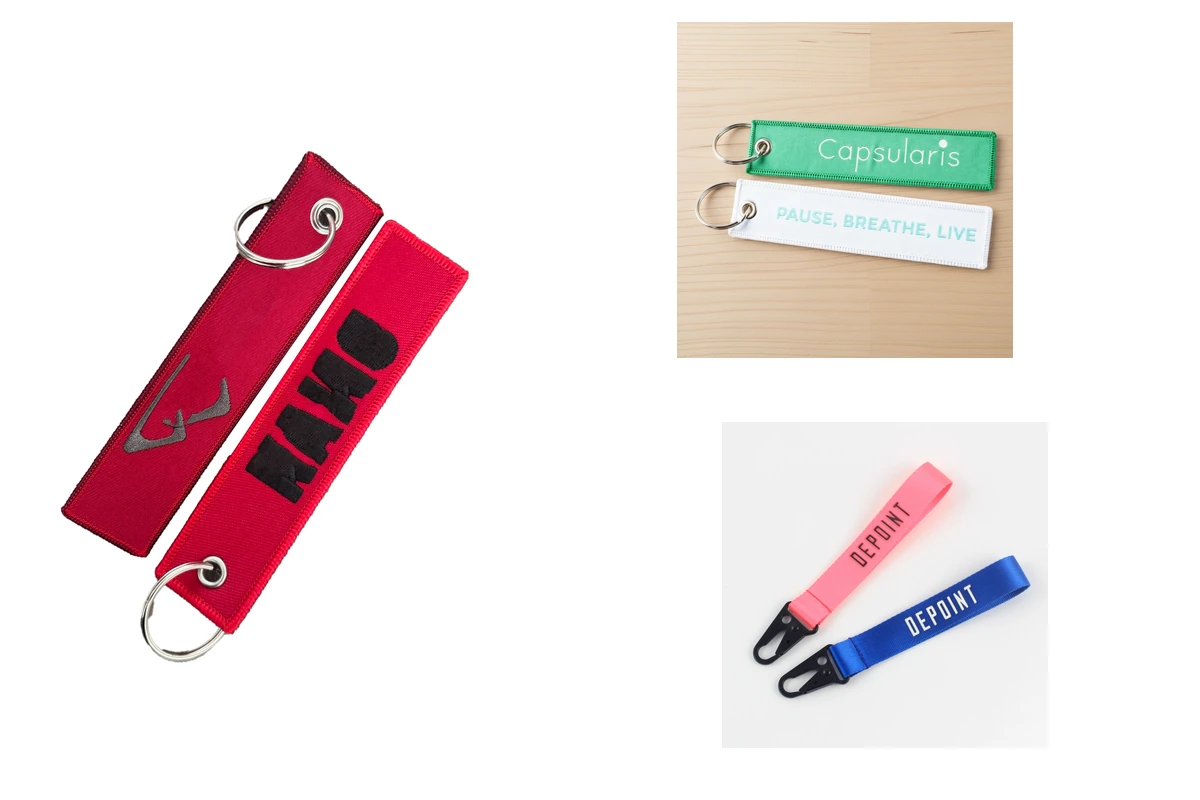 Red embroidered tags, green and white tags, and pink and blue wrist straps.
