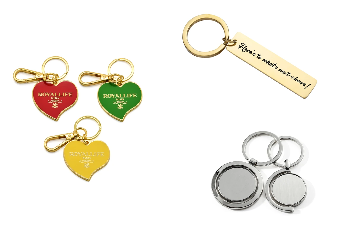 Heart-shaped metal tags, a gold-tone bar, and round silver-tone keychains.