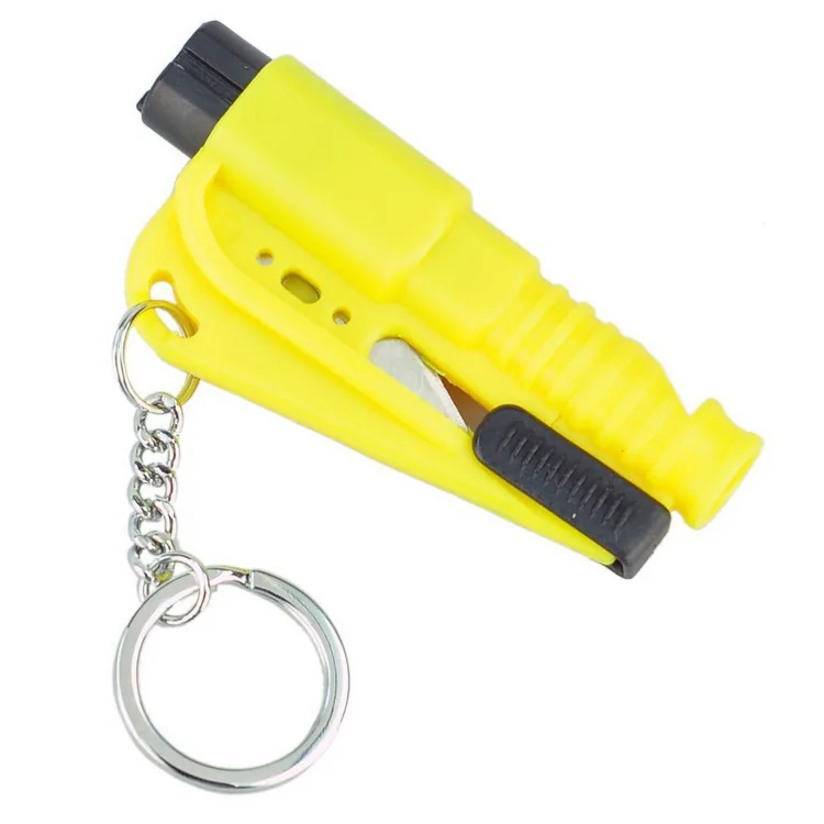 Yellow compact car escape tool keychain with a black end cap and side slider.
