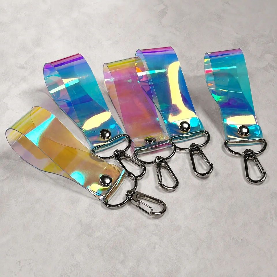 Iridescent wristlet keychains with silver-tone swivel clasps.