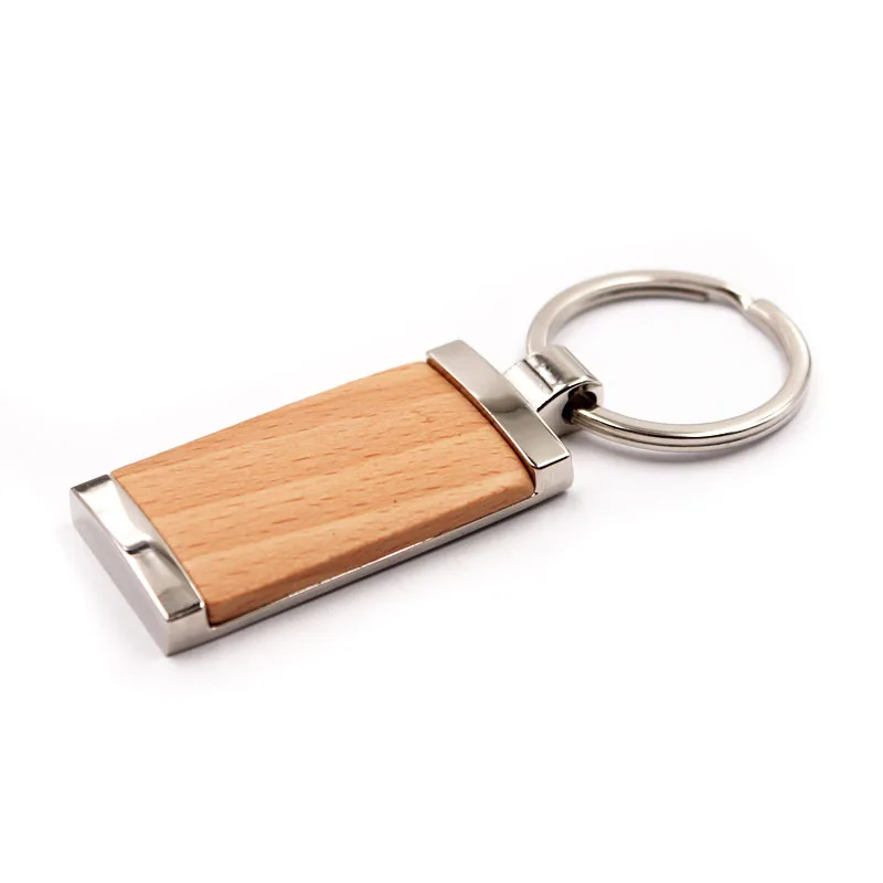 Angled view of a rectangular wooden keychain with silver-tone metal trim.