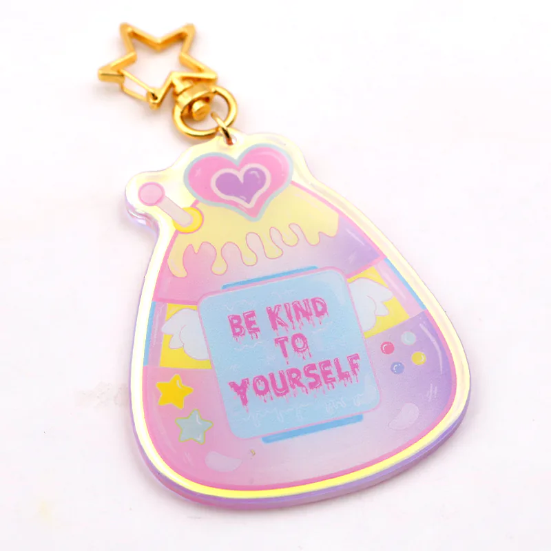 Pastel potion bottle keychain with BE KIND TO YOURSELF lettering and a gold-tone star clasp.