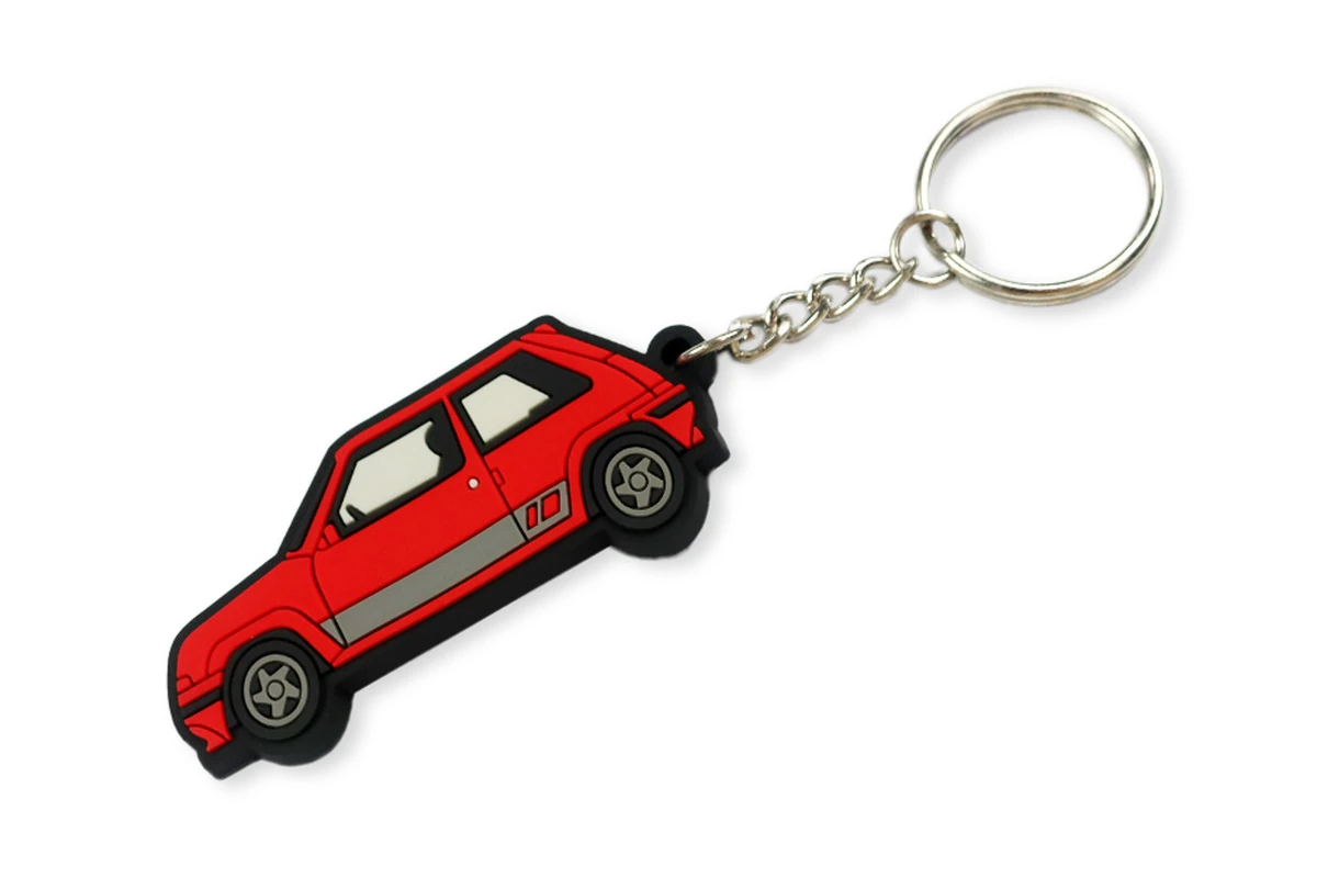 Red car-shaped keychain with a silver-tone chain and ring.